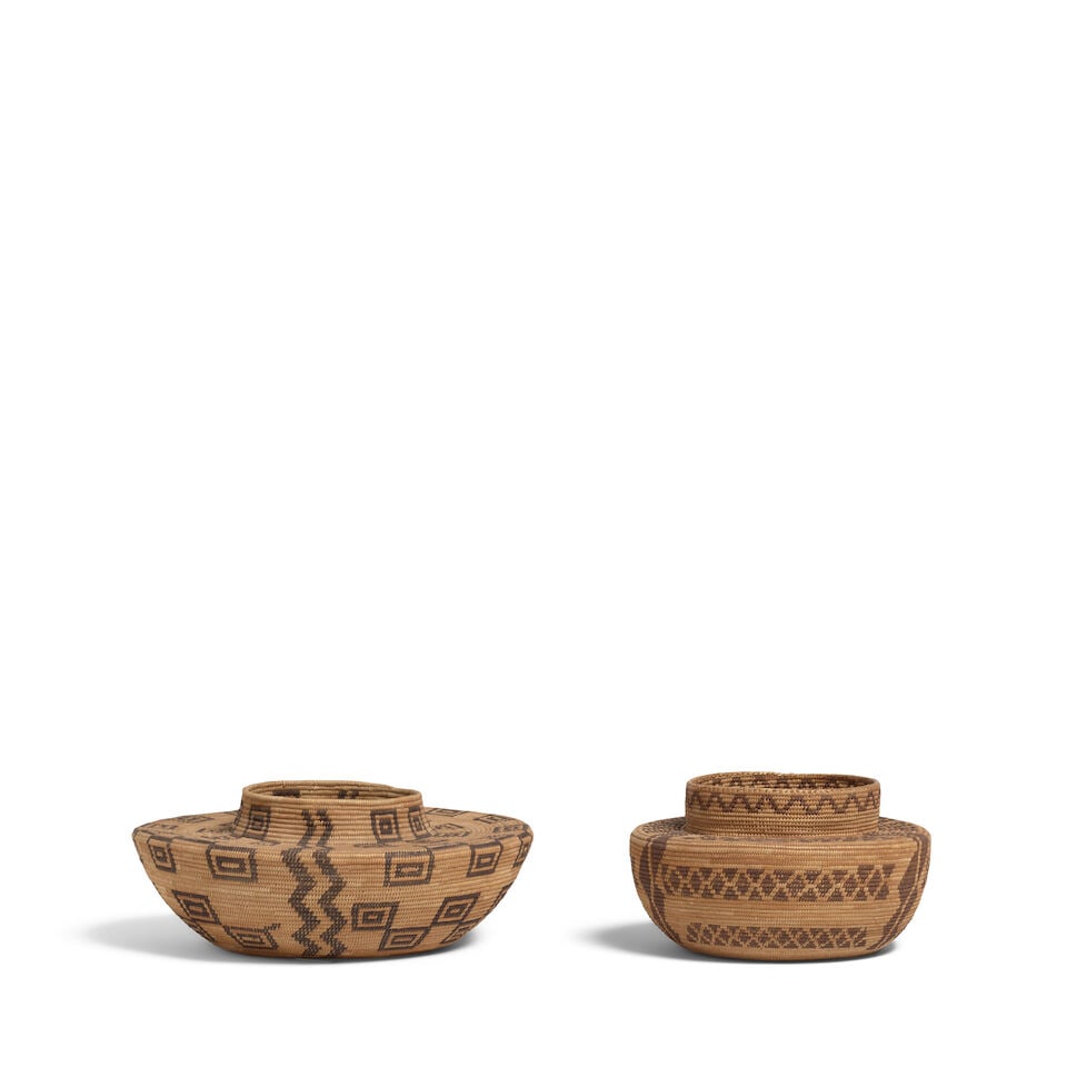 Two Western Mono bottleneck baskets: Two Western Mono bottleneck baskets The larger example with bands of stepped box motifs bisected by twin zigzag verticals; the smaller with rattlesnake bands set between eccentric trapezoidal columns.