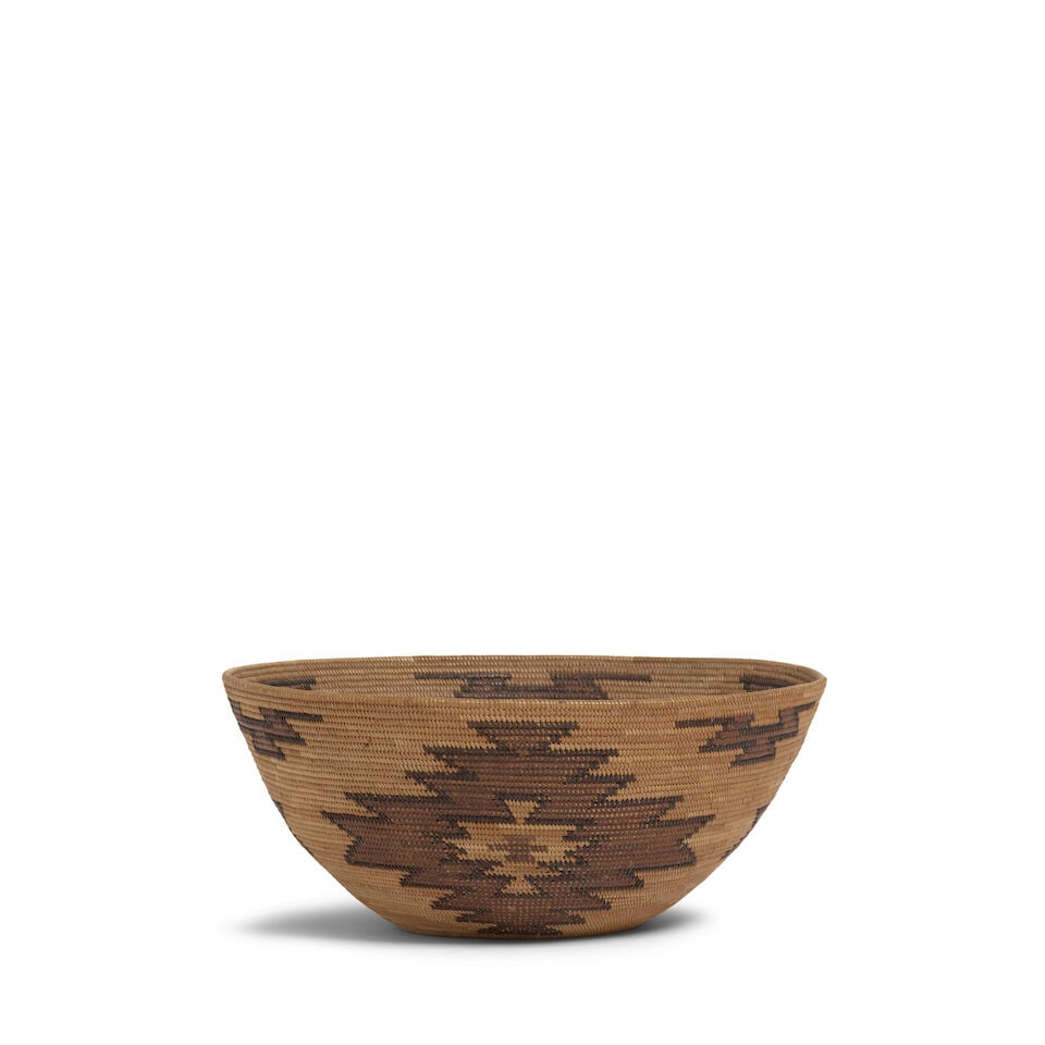 A Panamint Shoshone (Timbisha) polychrome basket: A Panamint Shoshone (Timbisha) polychrome basket A trio of concentric serrated diamond motifs about the bowl, sawtooth fretwork accents at the rim. diameter 8 3/8in, height 3
