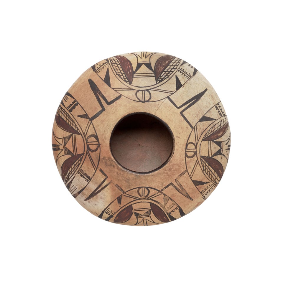 A Polacca polychrome pictorial jar, attributed to Nampeyo: A Polacca polychrome pictorial seed jar Attributed to Nampeyo, Hopi-Tewa, (1859-1942), painted with four repeat moth motifs above the shoulder. diameter 5 7/8in, height