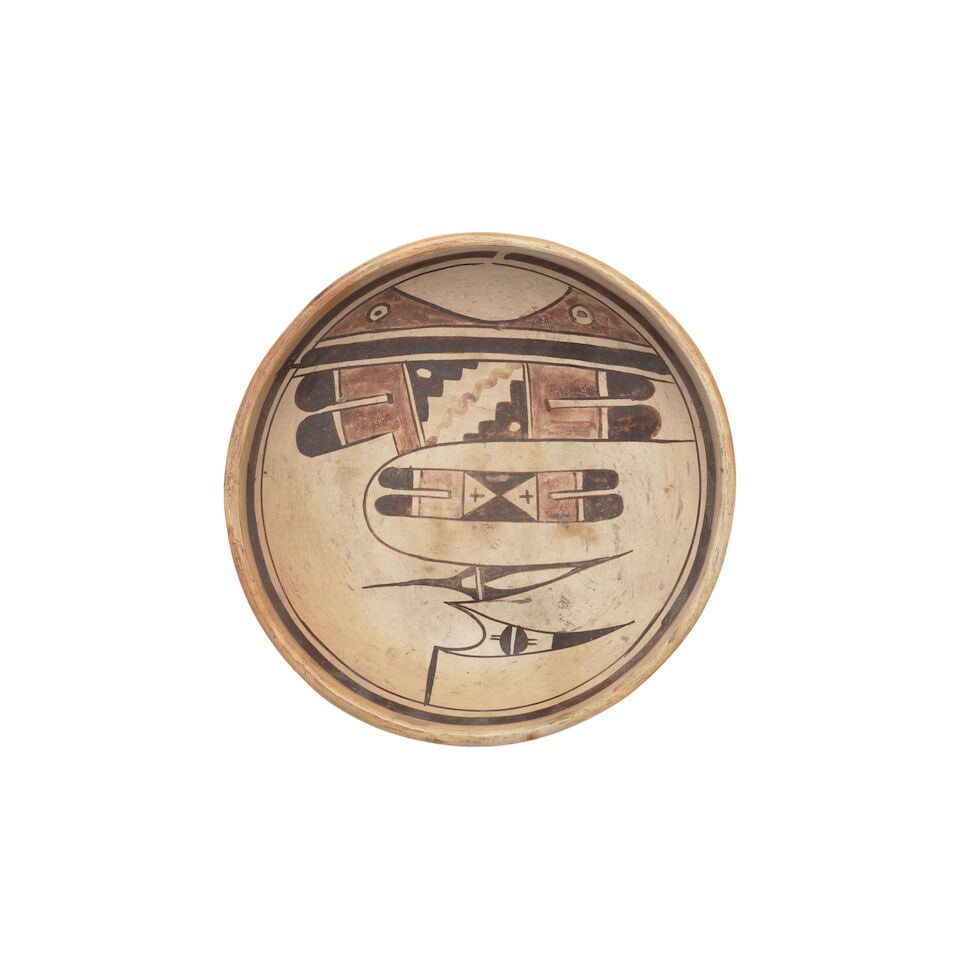 A Hopi polychrome bowl, attributed to Nampeyo: A Hopi polychrome bowl Attributed to Nampeyo, Hopi-Tewa, (1859-1942), painted with a procession of avian and feather motifs. diameter 7 1/8in, height 2in Footnotes: Provenance Adobe Gallery, Santa