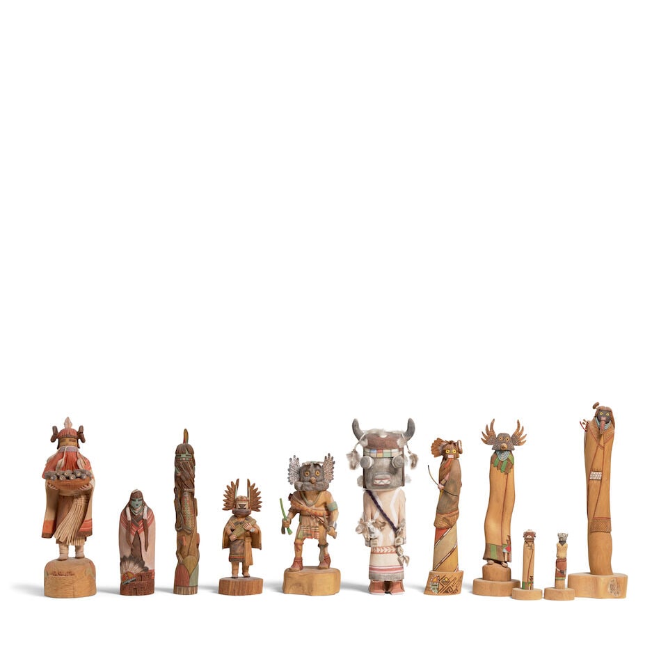 A grouping of eleven modern Hopi katsina figures: A grouping of eleven modern Hopi katsina figures 20th / 21st century, carved and painted wood, including a Corn Maiden, 'R. (Ronald) Honyouti' [b. 1955]; another maiden signed 'L. Honyouti'; another