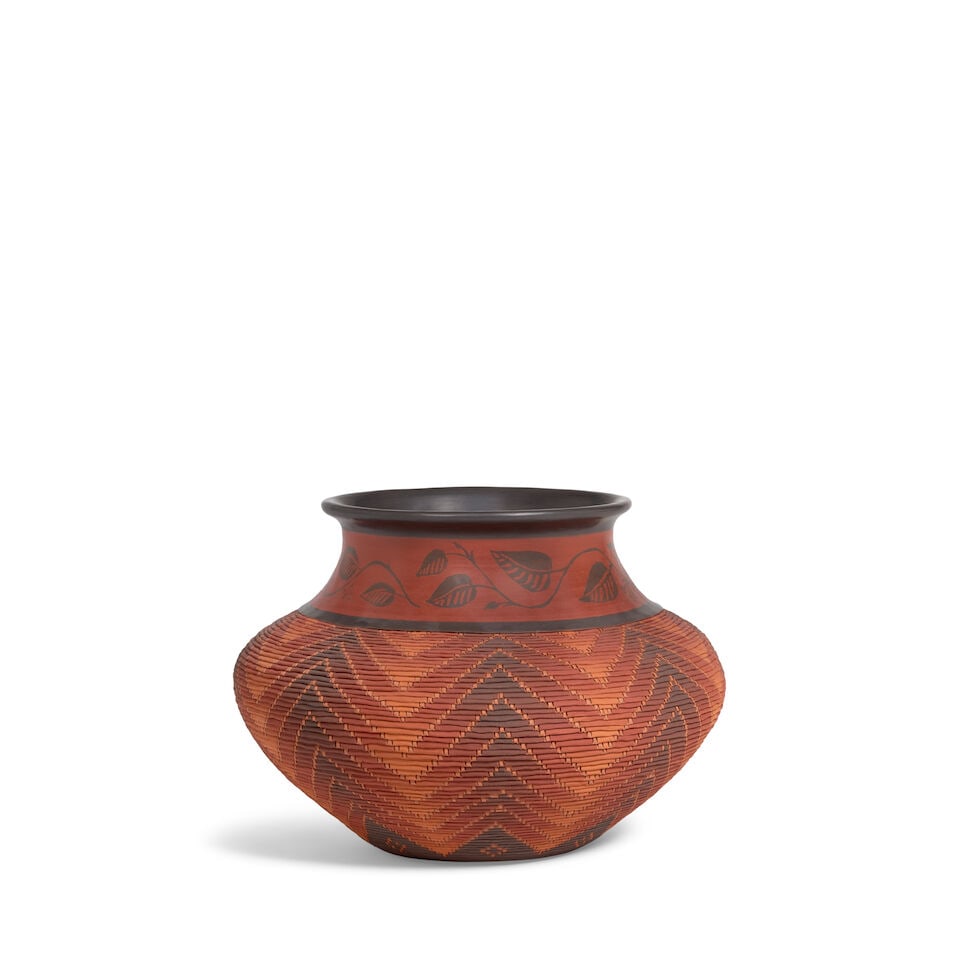 A Richard Zane Smith polychrome corrugated pottery jar: Richard Zane Smith Wyandot, (b. 1955), 2009, a polychrome corrugated pottery jar, the neck decorated with winding leafy vines, the body worked in a zigzag pattern with ombre palette, an eight-pointed