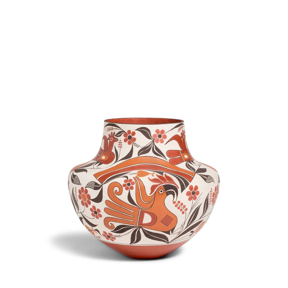 A Barbara and Joseph Cerno polychrome parrot jar: Barbara and Joseph Cerno Hopi-Tewa/Acoma, (b. 1951), and Acoma, (b. 1947), 1996, a four-color parrot jar, painted with alternating registers of birds set amongst flowering plants and rainbow framing