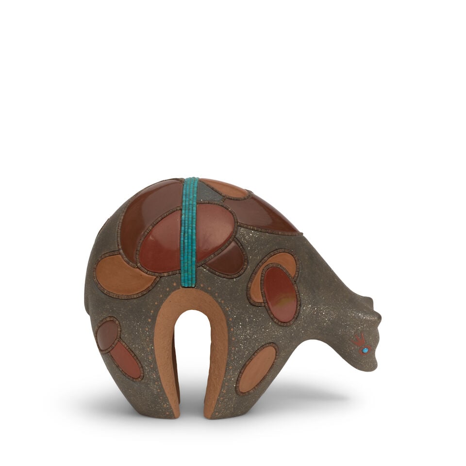A Russell Sanchez polychrome pottery bear effigy: Russell Sanchez San Ildefonso, (b. 1963), a polychrome pottery bear effigy, the body with polished multi-hued ovoids set with heishi bead borders, micaceous slip to the undecorated areas, a band of