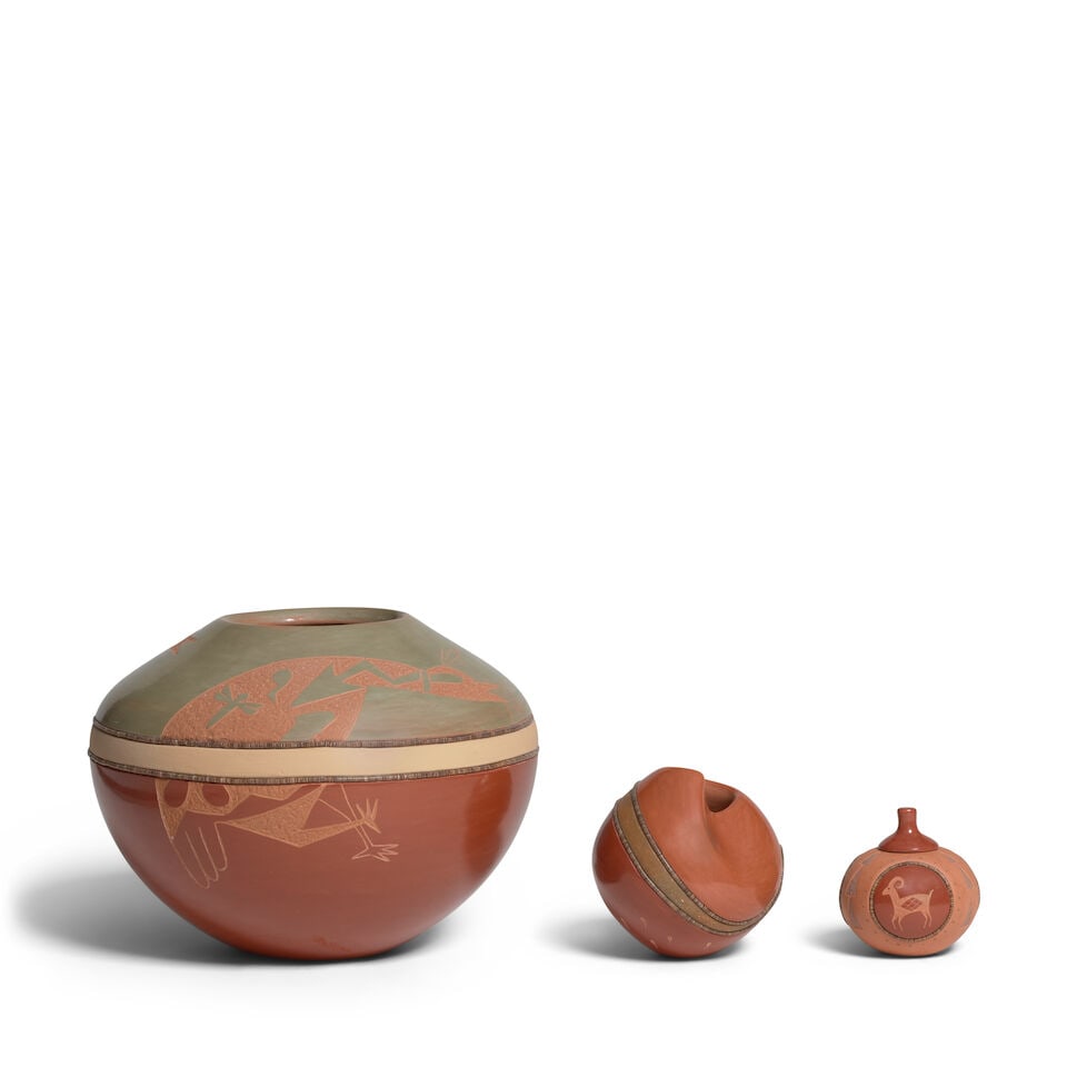Three Russell Sanchez sgraffito redware vessels: Russell Sanchez San Ildefonso, (b. 1963), three sgraffito redware vessels, the largest with three stylized birds across the body, heishi bands about the center; a petite undulating jar, tadpoles