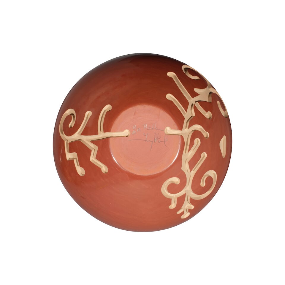 A Nathan Youngblood carved redware jar: Nathan Youngblood Santa Clara, (b. 1954), a carved redware jar, the upper hemisphere of rounded hexagonal form, the lower half with channel-carved organic meanders, signed at the base. diameter 6