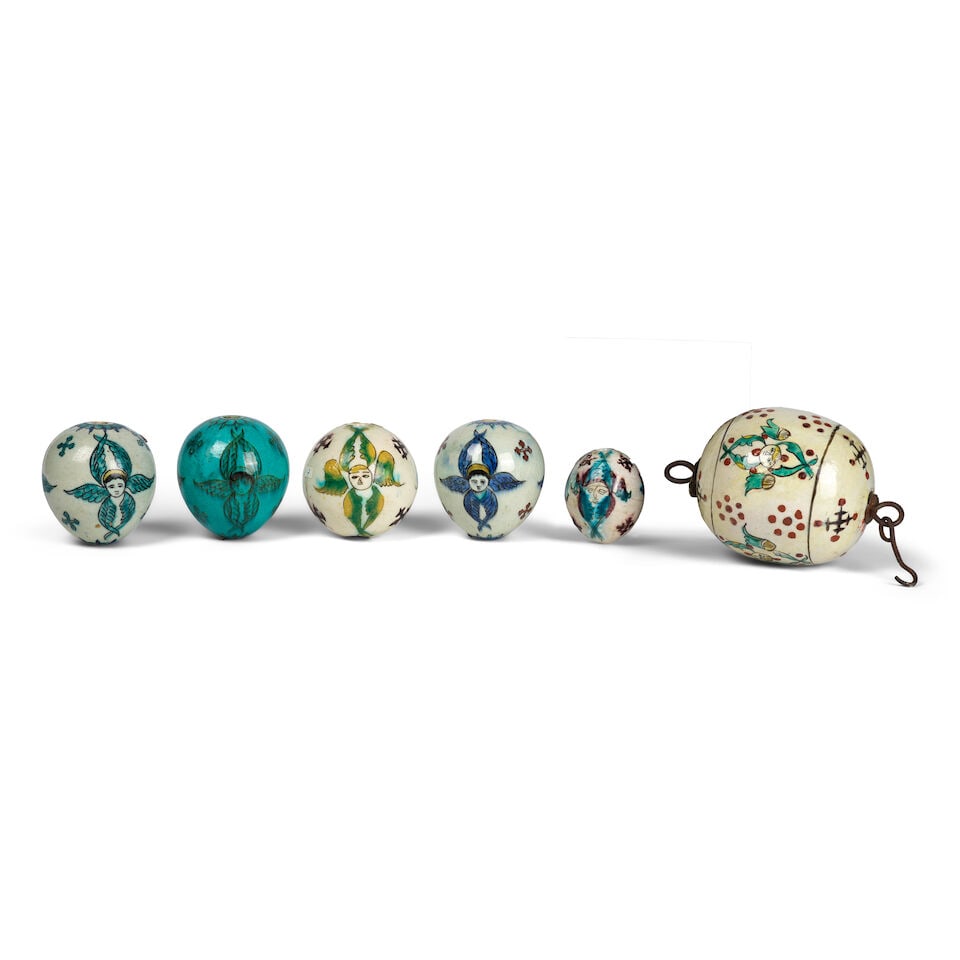 Ensemble de six ornements suspendus en poterie de Kutahya, Turquie, XVIIIème/ XIXème s...: Ensemble de six ornements suspendus en poterie de Kutahya, Turquie, XVIIIème/ XIXème siècle A group of six Kutahya pottery hanging ornaments Turkey, 18th/ 19th Century each of bulbous