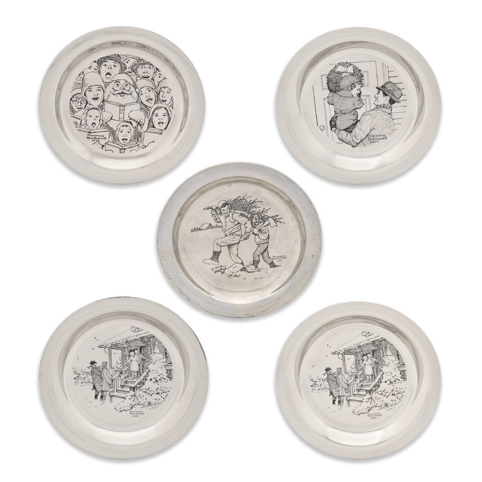 Seven Franklin Mint Limited Edition Annual Christmas Plates by Norman Rockwell: Seven Franklin Mint Limited Edition Annual Christmas Plates by Norman Rockwell includes the 1970 plate 'Bringing Home the Tree,' two 1971 plates 'Under the Mistletoe,' the 1972 plate 'The Carolers,' t