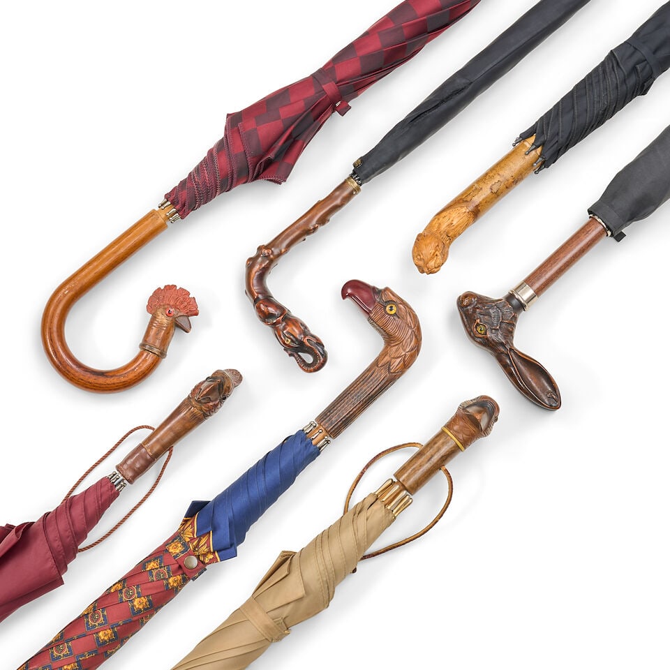 Seven Assorted Carved Animal-head Umbrellas, 20th century, (1 of 2)