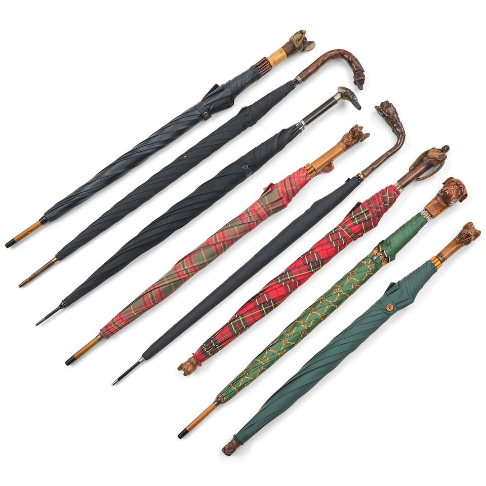 Eight Carved Dog-head Umbrellas, 20th century, - 2