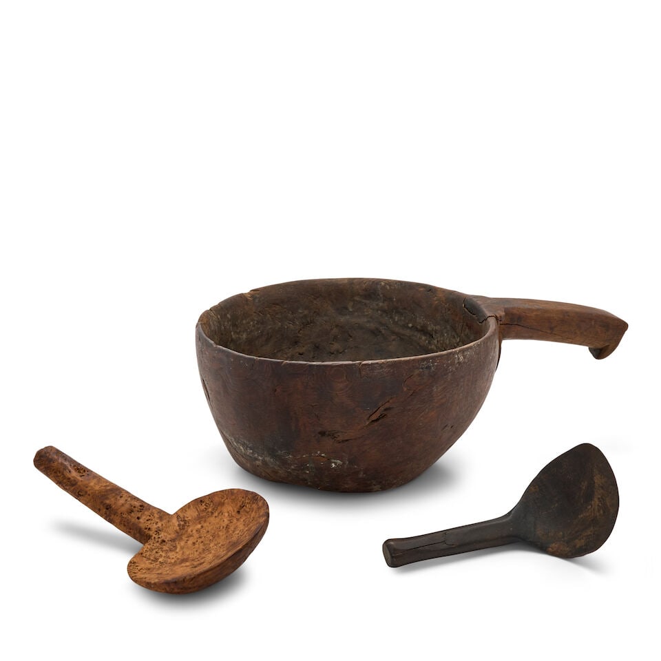 Three Carved Wooden Scoops, North America, 19th century,: Three Carved Wooden Scoops, North America, 19th century, comprising a large deep-bowled scoop with hooked handle, a burlwood scoop with shallow bowl, and a smaller dark scoop with straight handle,