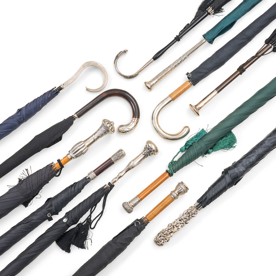 Twelve Metal and Sterling Silver-mounted Handle Umbrellas, 20th century,: Twelve Metal and Sterling Silver-mounted Handle Umbrellas, 20th century, including five with sterling silver-mounted handles and impressed marks, lg. to 39 1/2 in. For further information on this lot