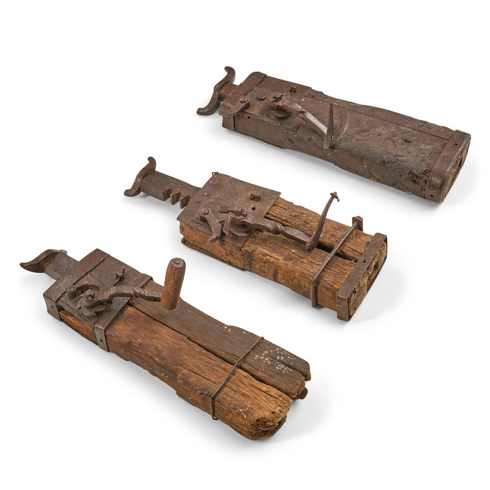 Three Dated Wagon Jacks, 1802, 1850, and 1860,: Three Dated Wagon Jacks, 1802, 1850, and 1860, each with a rectangular wood body fitted with wrought-iron straps and plates, a ratcheting mechanism, crank handle, and lifting arm, respectively dated '