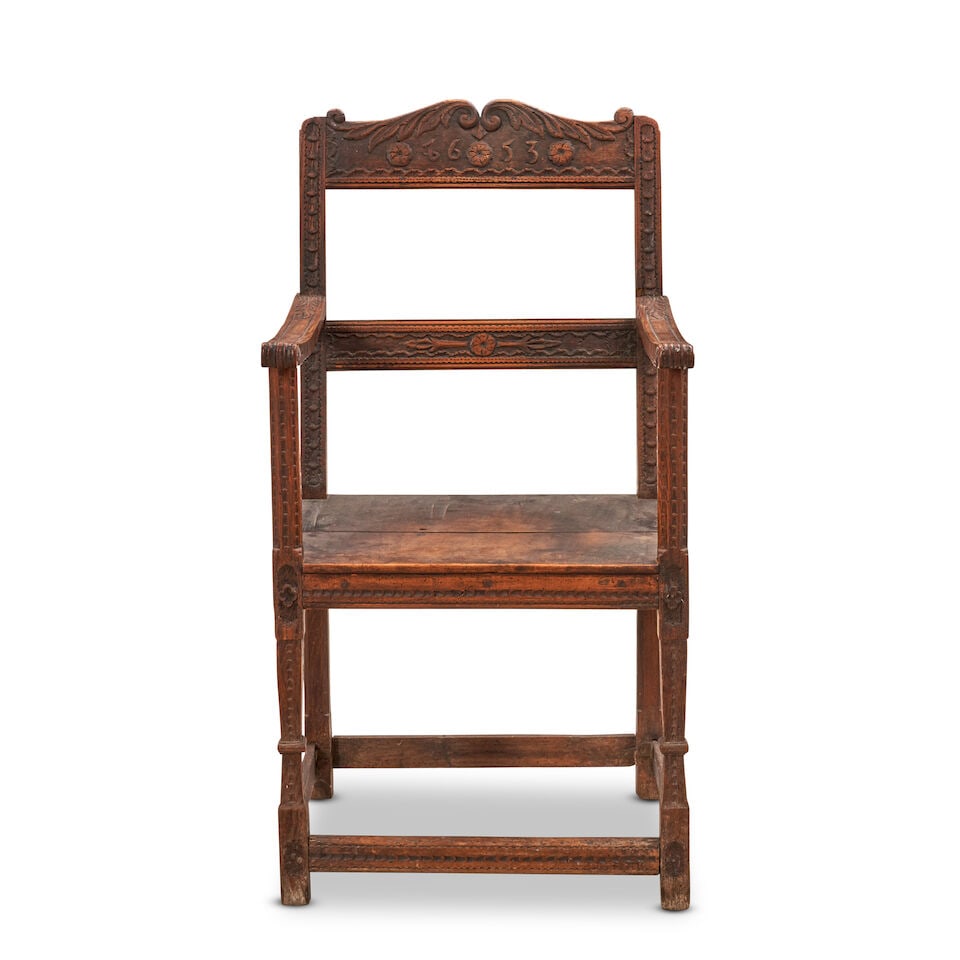 A Carved Oak Armchair, (1 of 2)
