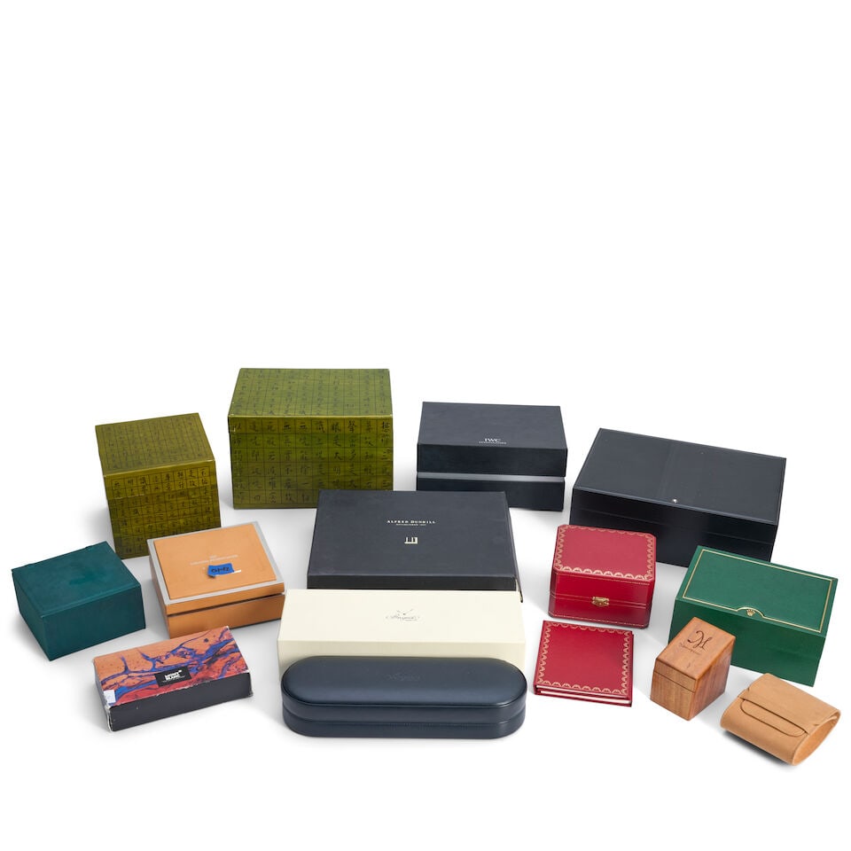 Group Of Thirteen Watch And Pen Presentation Boxes And Cases,: Group Of Thirteen Watch And Pen Presentation Boxes And Cases, including boxes and cases by IWC Schaffhausen, Alfred Dunhill, Girard-Perregaux, Montblanc, Breguet, Cartier, and Rolex, the Breguet box c