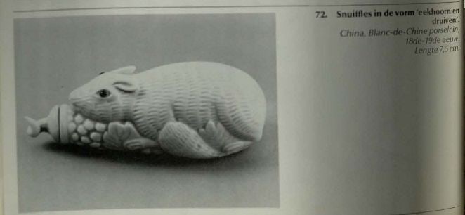 A MOULDED WHITE-GLAZED 'SQUIRREL AND GRAPES' SNUFF BOTTLE Circa 1850 - 2
