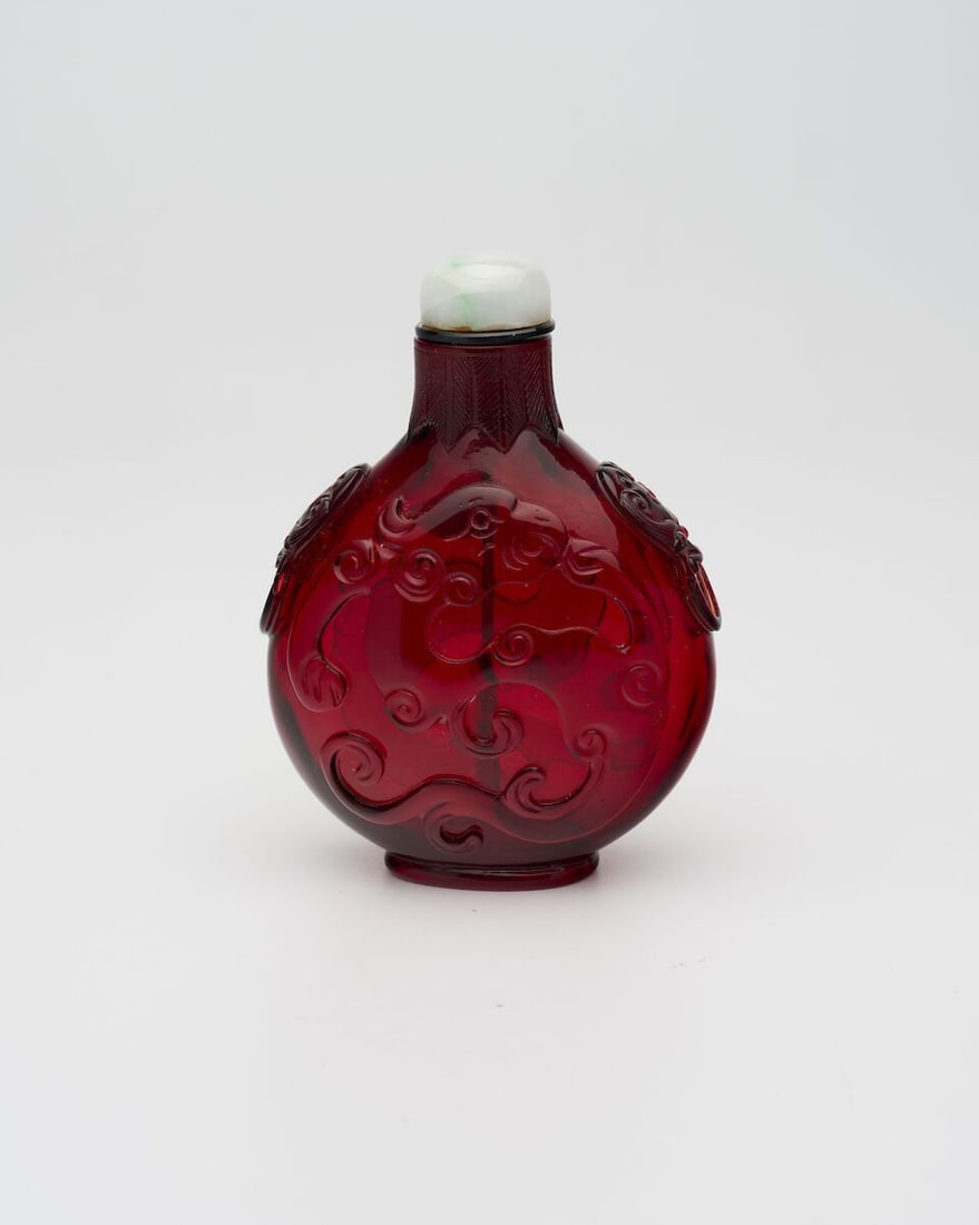 A RUBY-RED GLASS 'DRAGON AND PHOENIX' SNUFF BOTTLE Qianlong two-character wheel-cut mark, 19th c... (1 of 9)