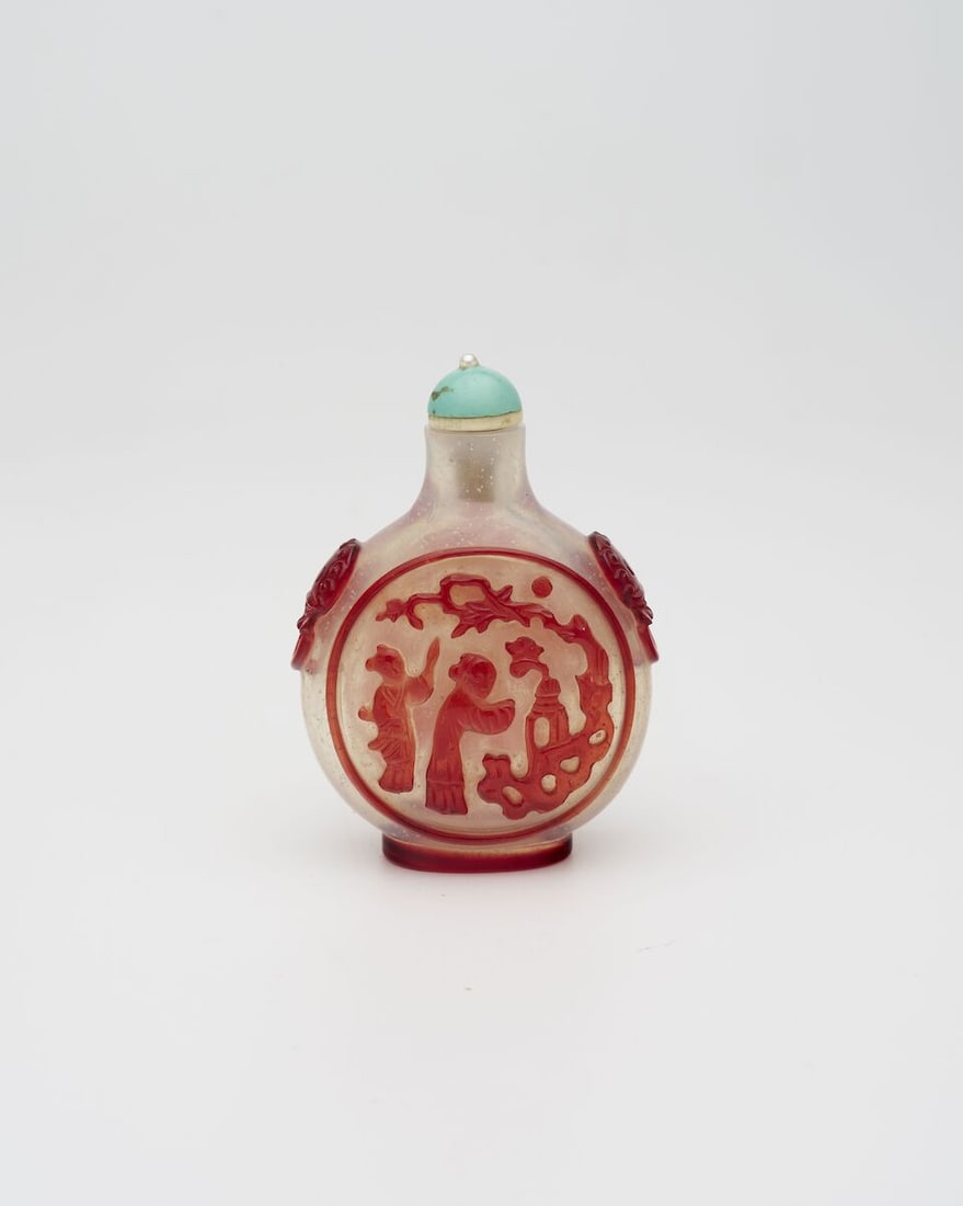 A RED OVERLAY GLASS 'FOLKLORE' SNUFF BOTTLE 19th century - 2