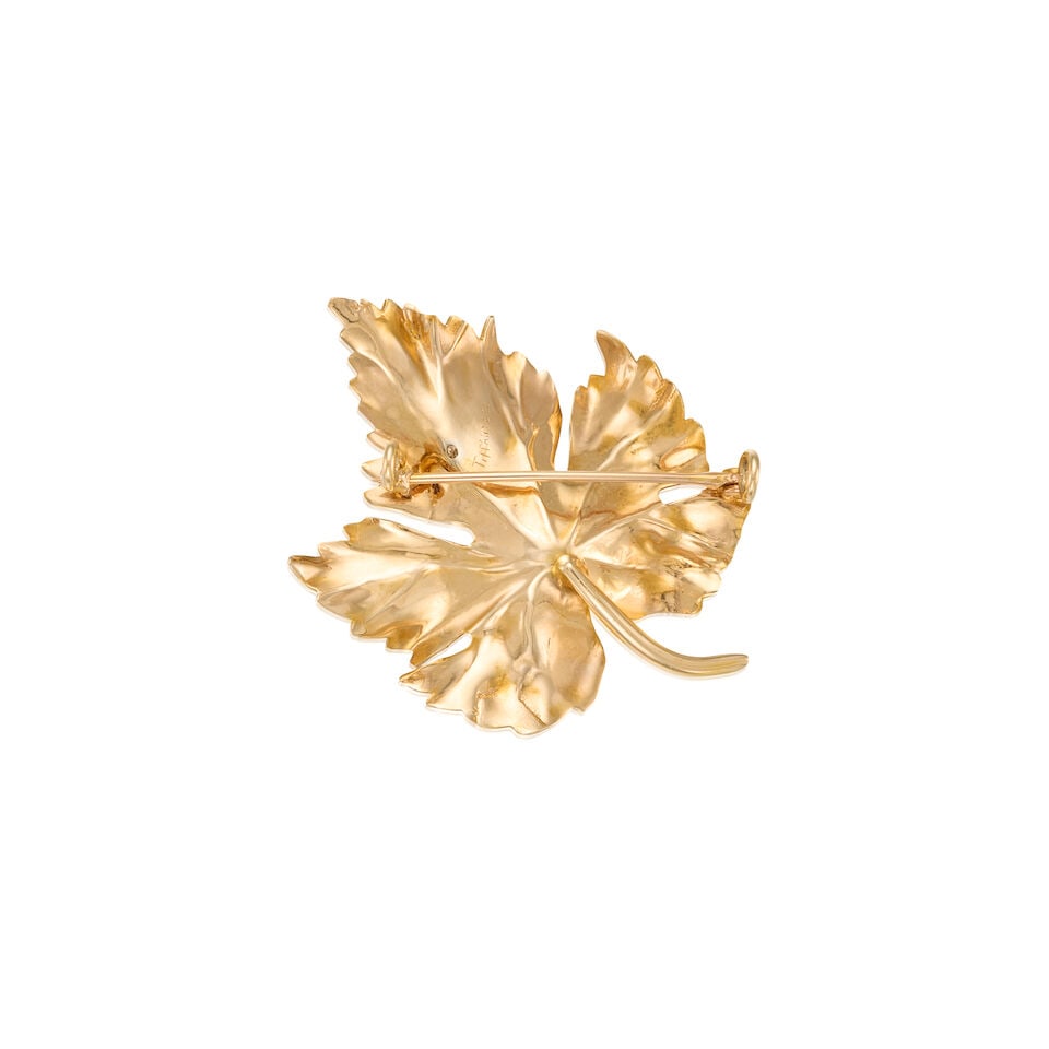 TIFFANY & CO.: A 14K GOLD AND DIAMOND LEAF BROOCH - 2