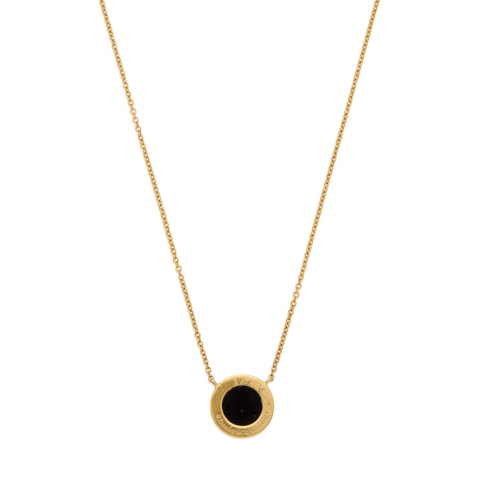 TIFFANY & CO.: A 18K YELLOW GOLD 'TIFFANY T' ONYX AND DIAMOND PENDANT NECKLACE - 2