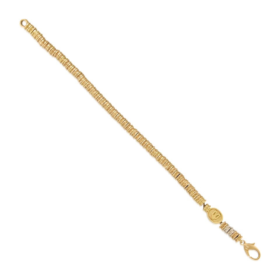 18K YELLOW GOLD BEAD BRACELET: 18K YELLOW GOLD BEAD BRACELET • Numerous gold beads measuring approximately 5.29mm in diameter • Length 7 1/2 in. • Estimated gross weight: 33.4 grams Footnotes: OVERALL CONDITION: