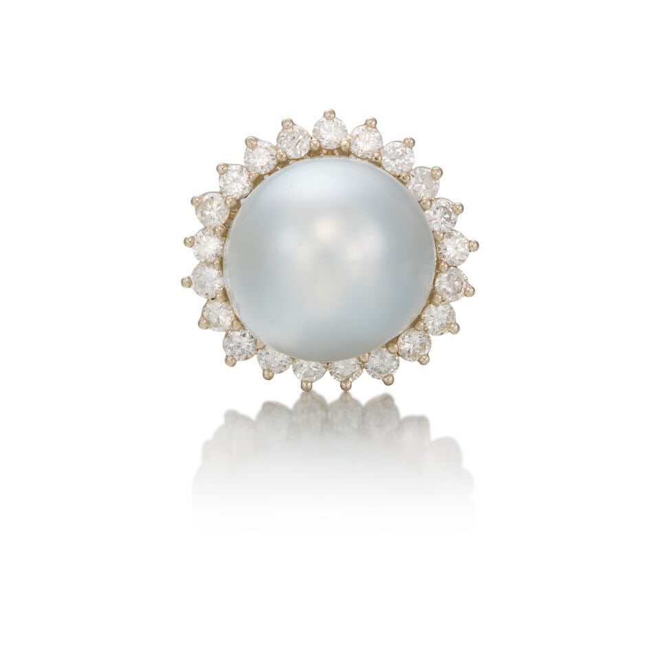 14K WHITE GOLD, CULTURED PEARL, AND DIAMOND RING: 14K WHITE GOLD, CULTURED PEARL, AND DIAMOND RING • One cultured pearl measuring approximately 17.59mm x 15.45mm • Numerous round shaped diamonds weighing approximately 0.84 carat total 