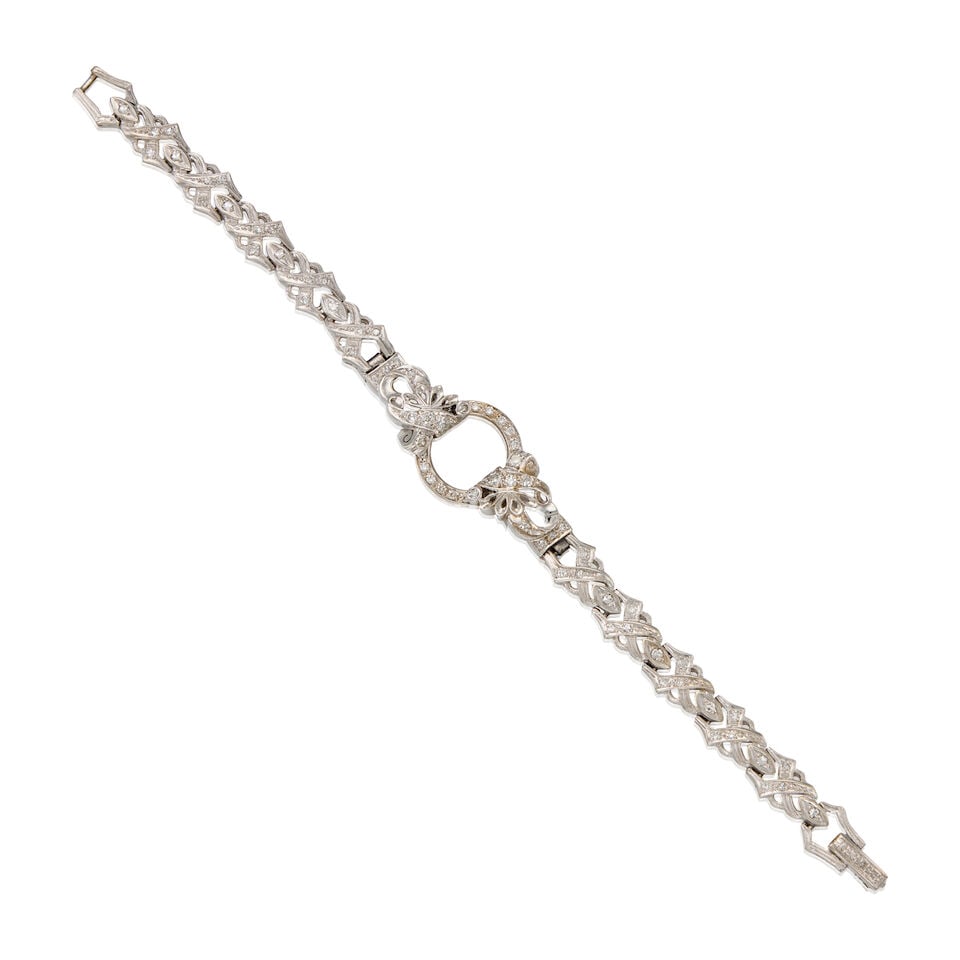 WHITE GOLD AND DIAMOND LINK BRACELET: WHITE GOLD AND DIAMOND LINK BRACELET • 14K and 18K white gold • Numerous round brilliant and round single cut diamonds weighing approximately 0.96 carat total • Italian maker's mark