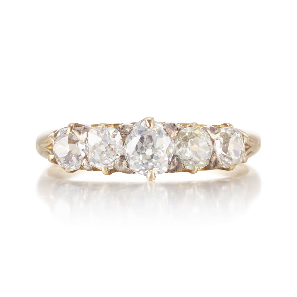 VINTAGE GOLD AND DIAMOND RING: VINTAGE GOLD AND DIAMOND RING • 14K and 18K yellow gold • Five old mine cut diamonds weighing approximately 1.09 carats total • Size 7 1/8 • Estimated gross weight: 2.80