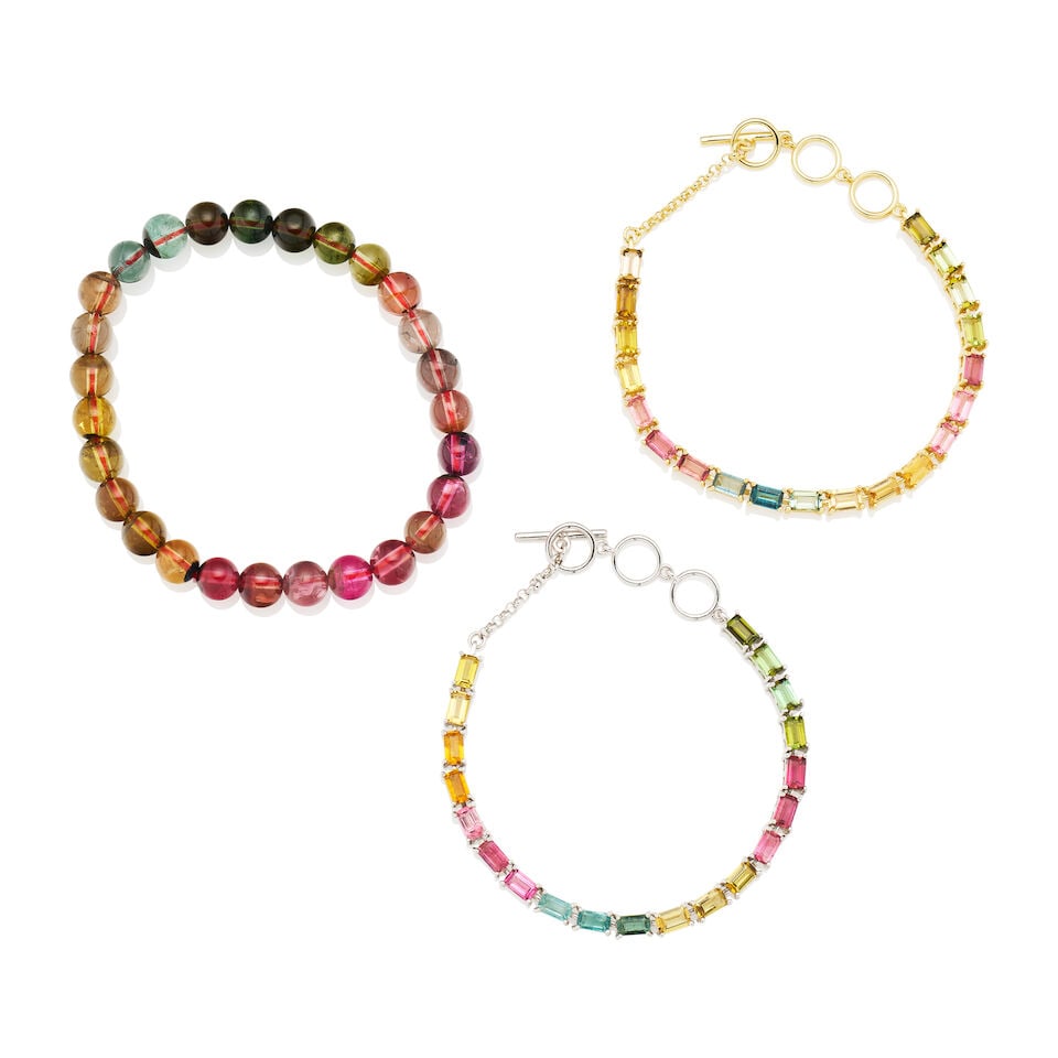 THREE TOURMALINE BRACELETS: THREE TOURMALINE BRACELETS 1. Polished round bead stretch bracelet; internal circumference 16cm. - 27 approximately 7mm beads in graduating tones of pink, green, olive and yellow - Estimated gross
