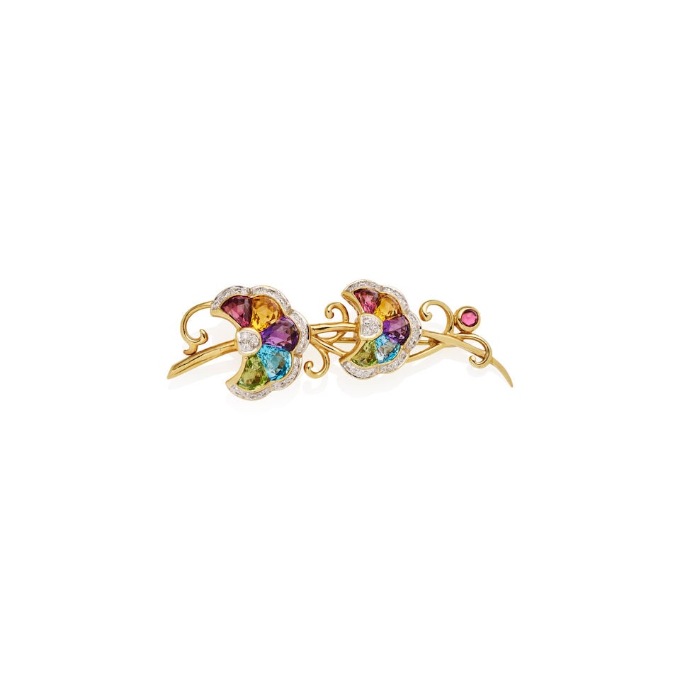 DIAMOND AND GEM-SET BROOCH: DIAMOND AND GEM-SET BROOCH • Set with fancy-cut peridot, citrine, amethyst, tourmaline and topaz • Accented with round brilliant-cut diamonds • Stamped 14K white and yellow gold R