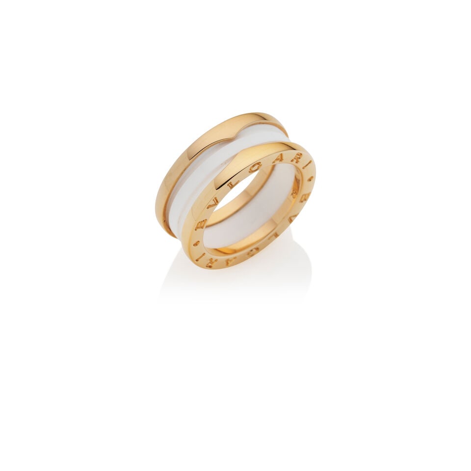BULGARI | ROSE GOLD AND WHITE CERAMIC 'B.ZERO1' RING: BULGARI | ROSE GOLD AND WHITE CERAMIC 'B.ZERO1' RING • Signed Bulgari, Au750, Made in Italy, Italian registry mark, numbered NN6ZZS, 52 • Accompanied by maker's fitted box, outer box, and