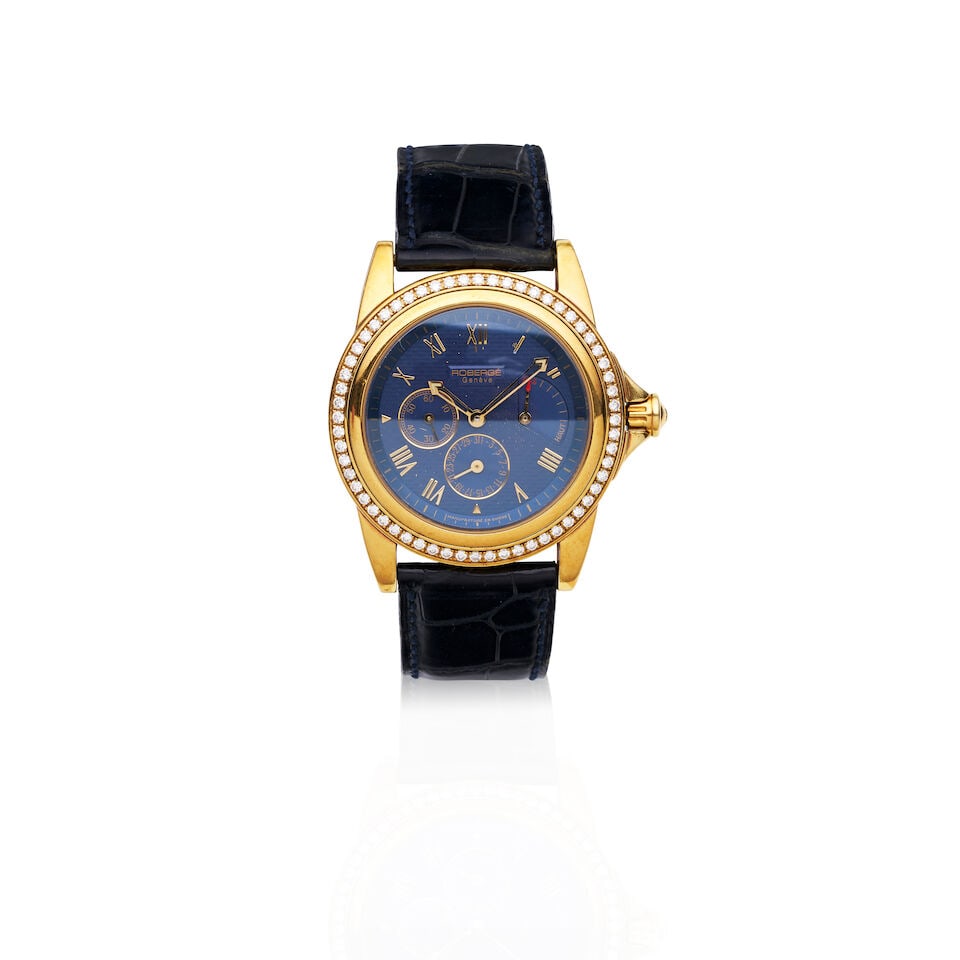 ROBERGÈ | 18CT GOLD CHRONOGRAPH WRISTWATCH: ROBERGÈ | 18CT GOLD CHRONOGRAPH WRISTWATCH Movement: Automatic Dial: Blue, signed Case: Polished tonneau form with diamond set bezel, glazed exhibition back, numbered 12112411, Swiss assay mark,