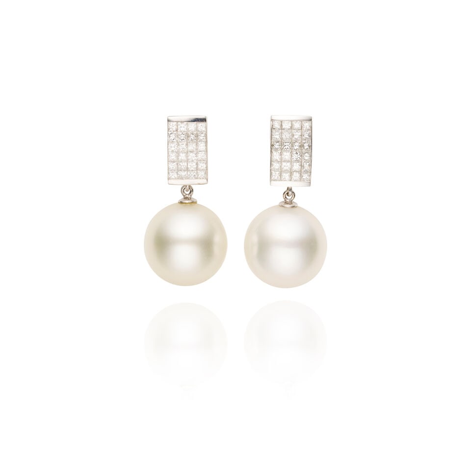 PAIR CULTURED PEARL AND DIAMOND EARRINGS: PAIR CULTURED PEARL AND DIAMOND EARRINGS - 2 round cultured pearls (14.3 - 14.2 mm) - Each with 24 princess-cut diamonds weighing approx. 0.65cts total - Stamped 750 18K, maker's mark WJC - Length