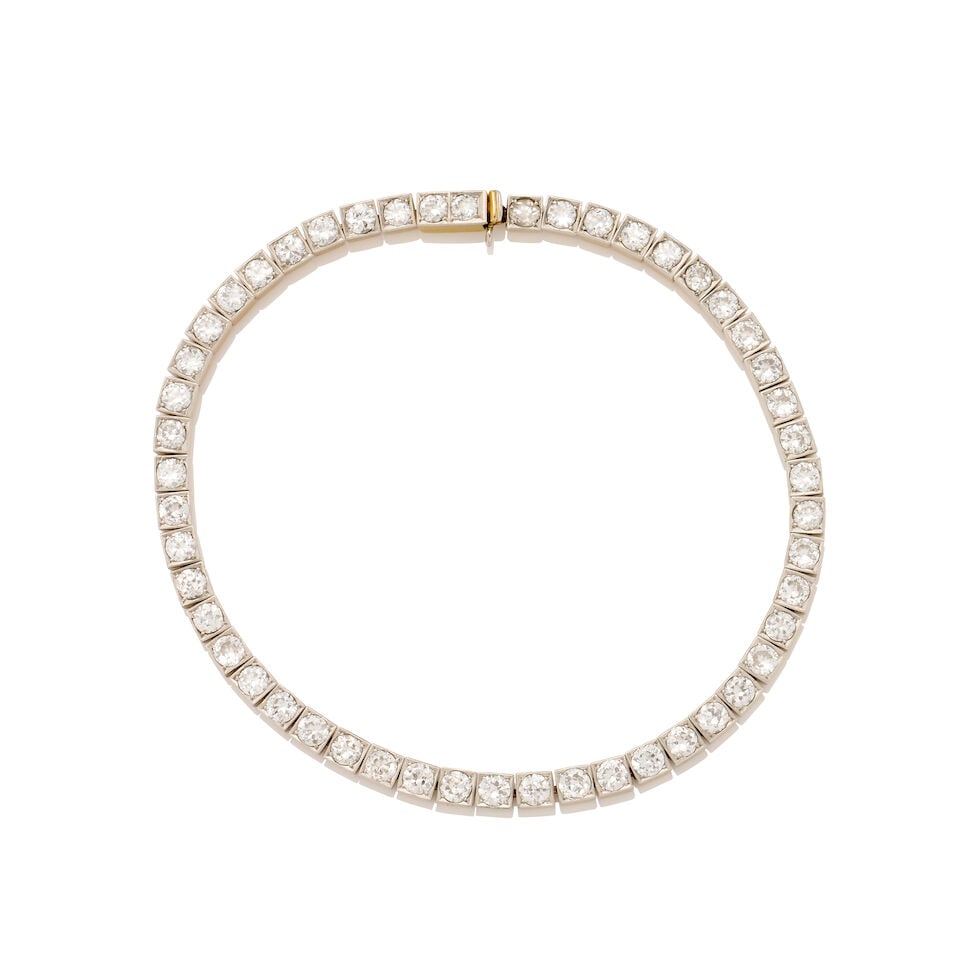 DIAMOND LINE BRACELET: DIAMOND LINE BRACELET Designed as a row of old European-cut diamonds, estimated total diamond weight 2.50ct, silver topped gold, weight 13.3gm, length 18.5cm. For further information on this lot