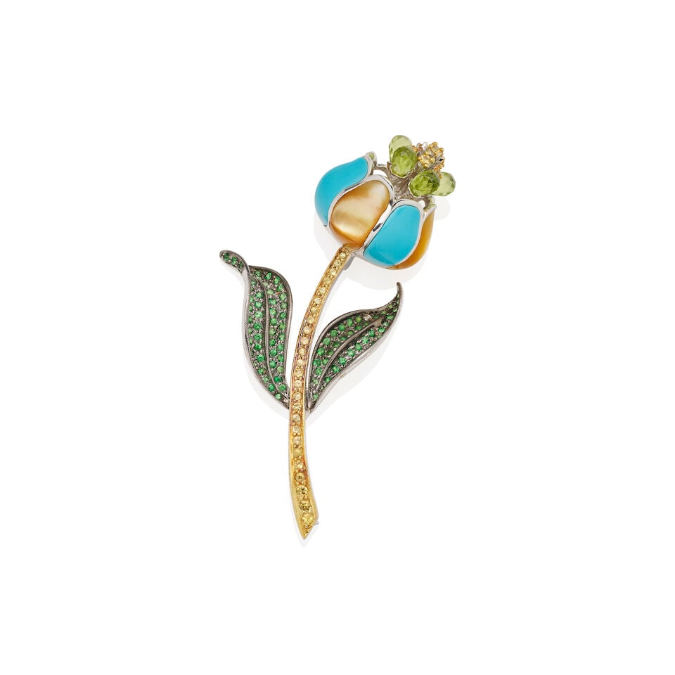 GEM-SET FLOWER BROOCH: GEM-SET FLOWER BROOCH • Five peridot briolette, multiple circular-cut yellow sapphires and tsavorite, mother of pearl and turquoise. • Stamped 18K 750 white and yellow gold • Estimat