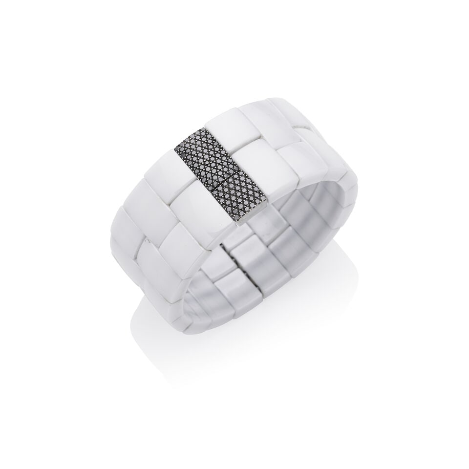 ROBERTO DEMEGLIO | CERAMIC AND BLACK DIAMOND BRACELET: ROBERTO DEMEGLIO | CERAMIC AND BLACK DIAMOND BRACELET The white ceramic bracelet with brick shaped links, pave-set with black diamonds in 18k white gold, signed Roberto Demeglio, stamped 750, Italian 
