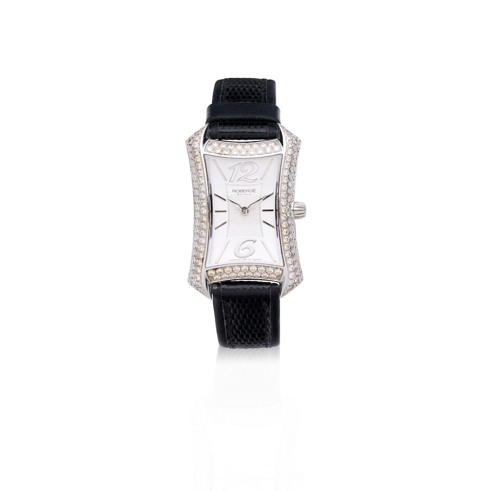 ROBERGÈ | STAINLESS STEEL AND DIAMOND 'APUS' WRISTWATCH: ROBERGÈ | STAINLESS STEEL AND DIAMOND 'APUS' WRISTWATCH Movement: quartz Dial: silver, signed Case: polished and brushed stainless, diamond set bezel stated total diamond weight 3.56cts, case num