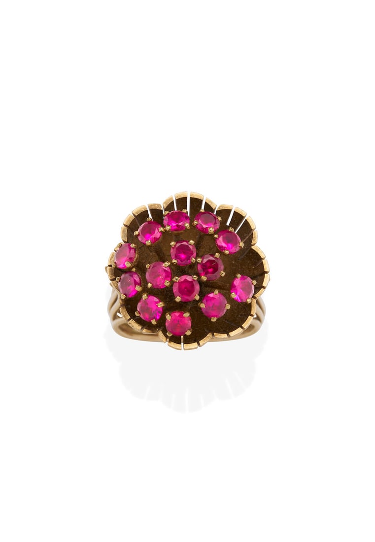 GOLD AND RUBY RING: GOLD AND RUBY RING - set with a cluster of 14 circular-cut rubies within a cupped scalloped mount. - weight 8.9gm - ring size K Footnotes: OVERALL CONDITION Wear in the form of light surface