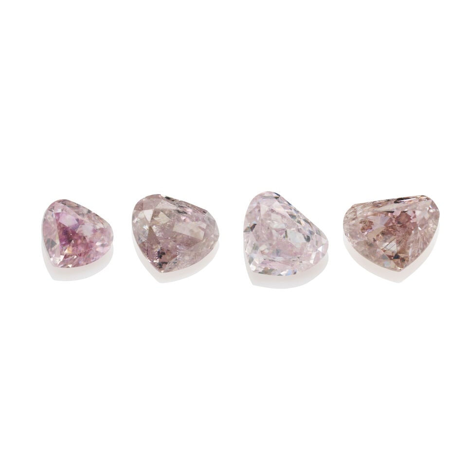 GROUP OF FOUR COLOUR UNMOUNTED DIAMONDS: GROUP OF FOUR COLOUR UNMOUNTED DIAMONDS 1. Heart shaped diamond weighing 0.11 carats, accompanied by GIL (Gemological International Laboratories Canada) dated 23 March 2021 stating that the natural