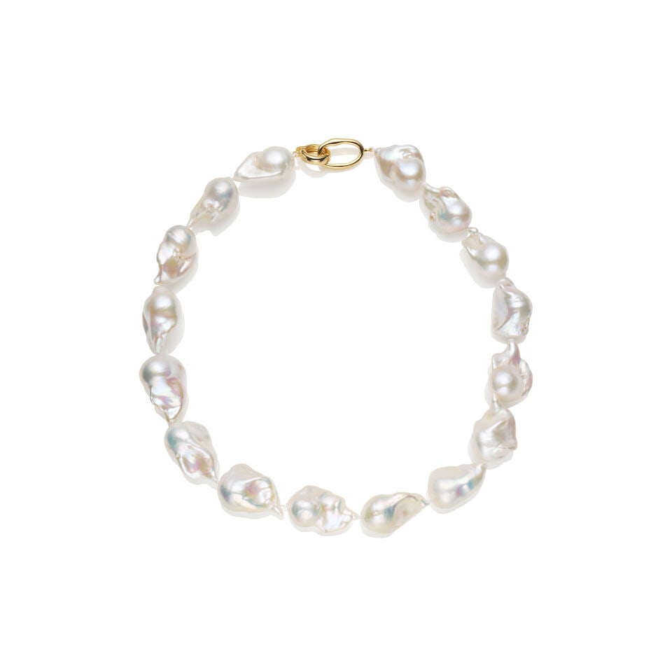 BAROQUE CULTURED PEARL NECKLACE: BAROQUE CULTURED PEARL NECKLACE - 16 baroque freshwater cultured pearls measuring approximately 26 x 17mm; full length 43cm. - Metal clasp unmarked; estimated gross weight approximately: 88.0gm Footno