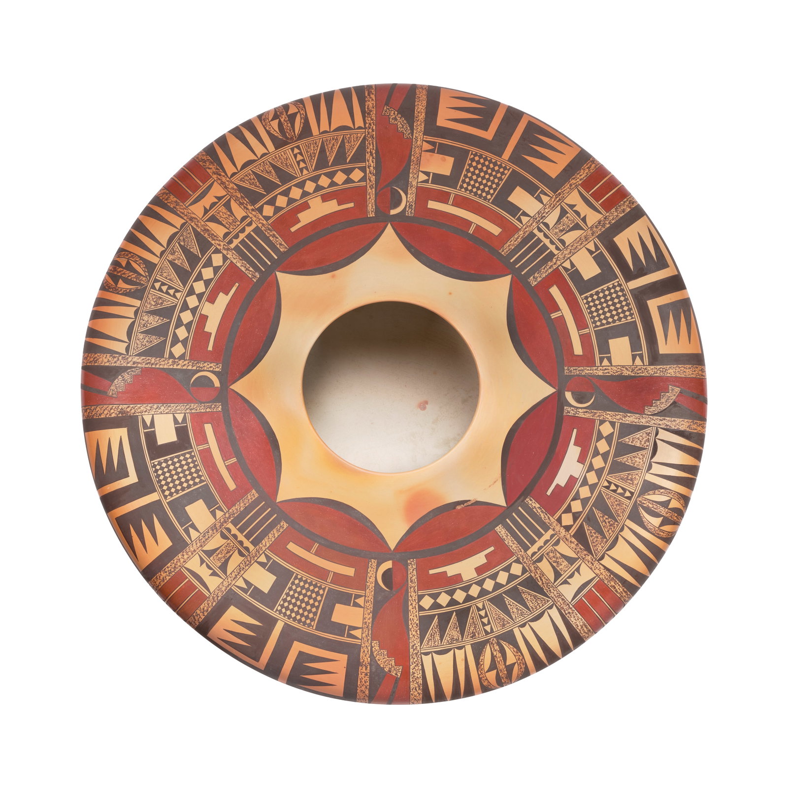 A large Steve Lucas polychrome pottery jar: Steve Lucas Hopi, (b. 1955), a large polychrome pottery jar, centering an eight-point star anchoring twin registers of dense geometric motifs. diameter 19 3/4in, height 7 1/2in Footnotes: Provenance P