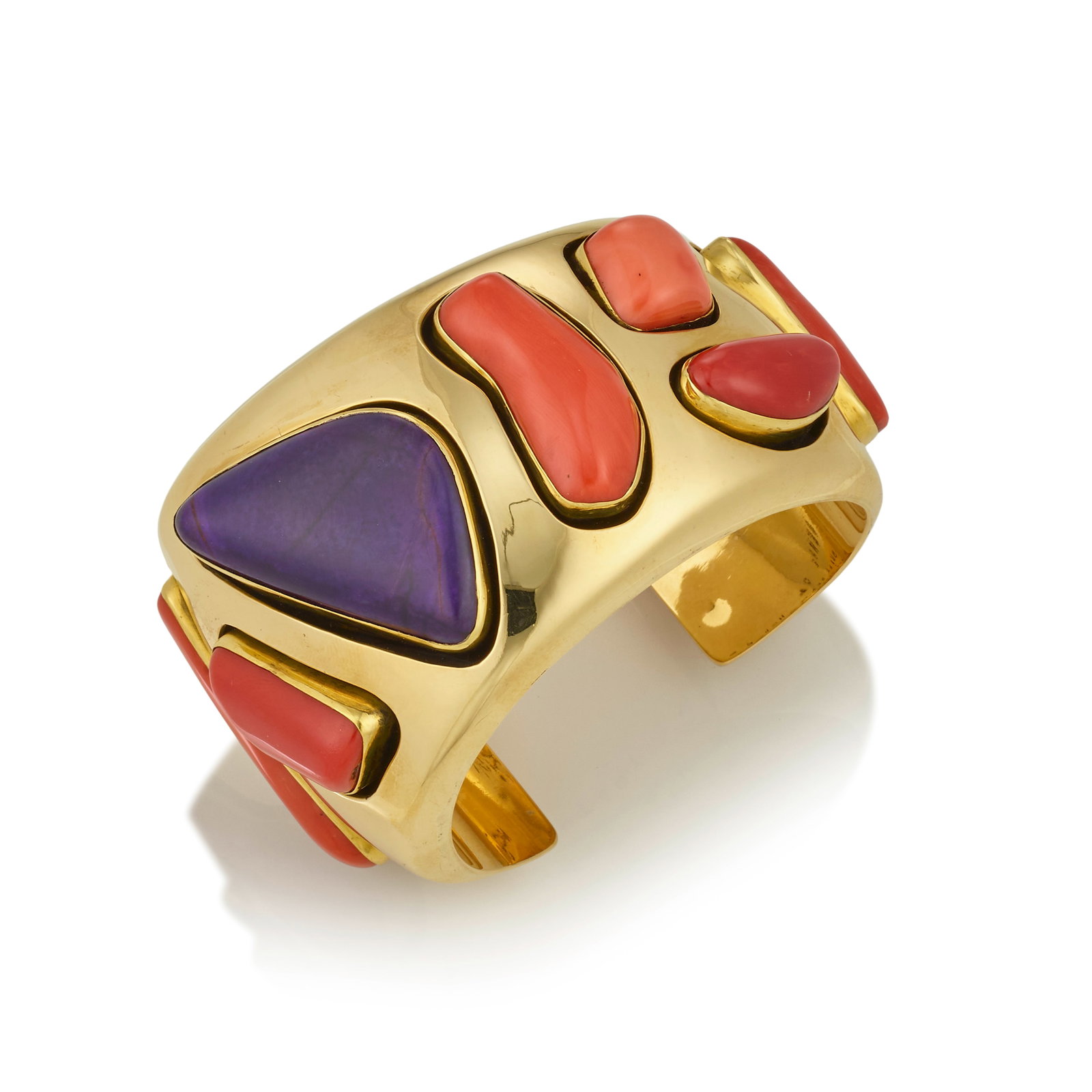 A Kim Rawdin 18K gold and multi-stone cuff bracelet, 'The Morning Sun,' 1999: Kim Rawdin American, (b. 1950), 'The Morning Sun,' 1999, a hollow 18k gold cuff bracelet set with coral and sugilite in 22k bezels, stamped inscription on the interior: The Morning Sun / Reinvents the