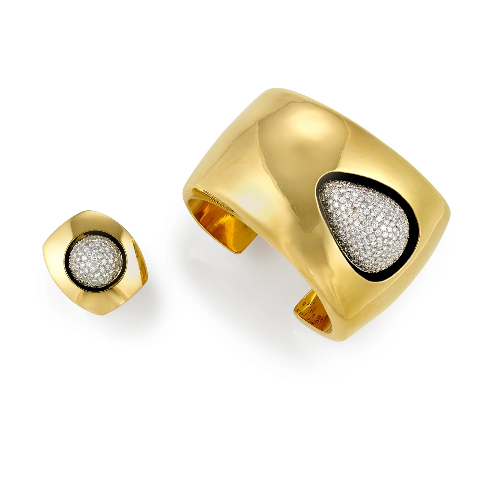 A Kim Rawdin 18k gold and pavé diamond cuff and ring: Kim Rawdin American, (b. 1950), 'Evening Winds Talk,' 1998, hollow 18k gold cuff with an inset ovoid form pavé-set with diamonds (250FC, TW approx. 5.25 carats, F-G/VS quality), stamped inscripti