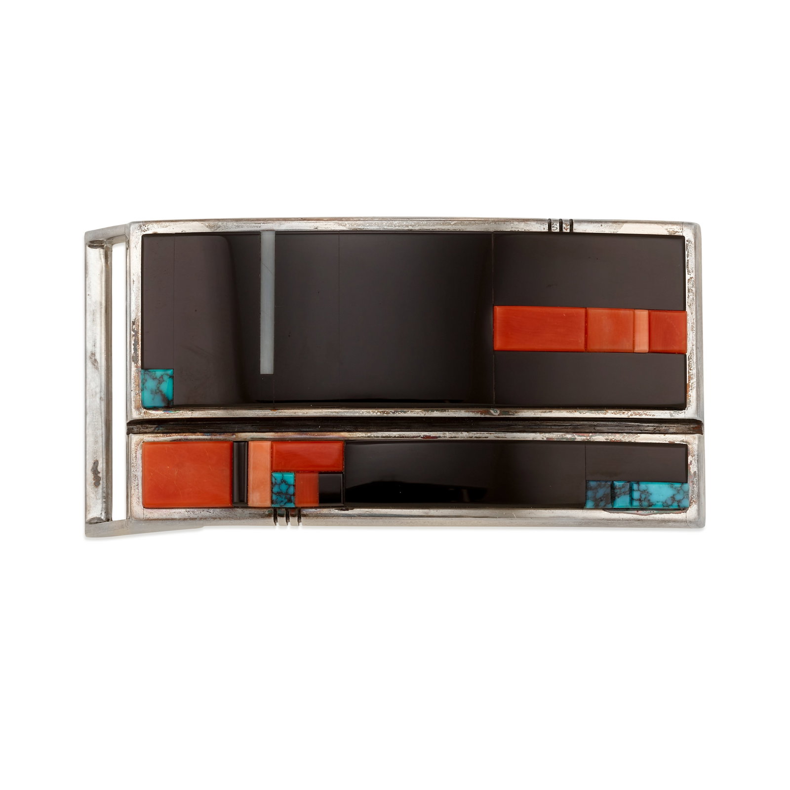 A Richard Chavez silver and multi-stone belt buckle: Richard Chavez San Felipe, (b. 1949), a silver and multi stone-inlaid buckle, set with black jade, coral and turquoise, signed verso in triplicate with artist's mark. length 3in, width 1 1/2in; gross 