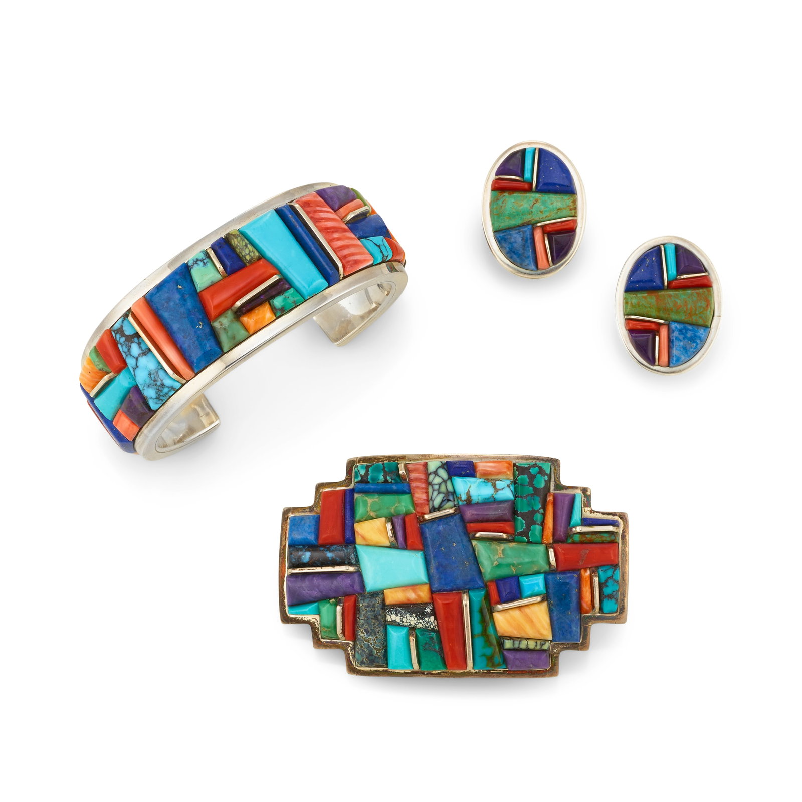 A Lynol Yellowhorse silver and multi-stone belt buckle, cuff bracelet and earring set: Lynol Yellowhorse Diné (Navajo), (1962-2003), a sterling silver bracelet, pair of earrings and multi-stone belt buckle suite, set with turquoise, coral, lapis and other material, each with stampe