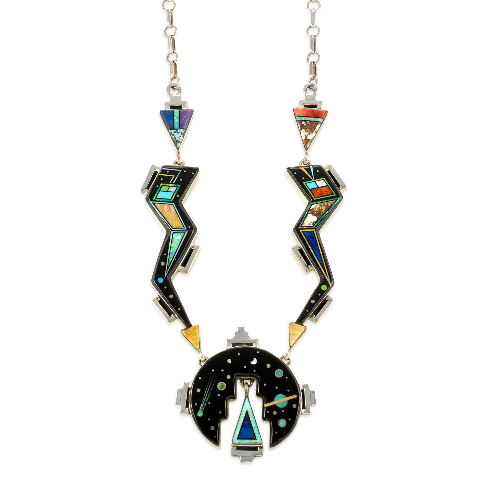 A Melvin Cleveland silver and multi-stone inlay necklace: Melvin Cleveland Diné (Navajo), (20th/21st century), a sterling silver, onyx, turquoise, coral and lapis necklace (micro inlaid in a Yei and cosmic motif), pendant signed with maker's mark and: M