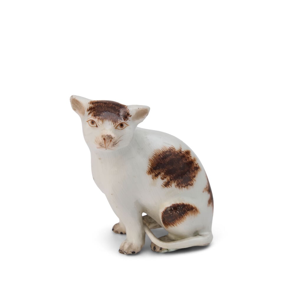 A Miniature Meissen Porcelain Model of a Seated Cat circa 1745: A Miniature Meissen Porcelain Model of a Seated Cat circa 1745 height 1 1/2 in. (3.81 cm.); width 7/8 in. (2.22 cm.); depth 5/8 in. (1.58 cm.) Footnotes: Provenance Christie's, Geneva, European Cerami