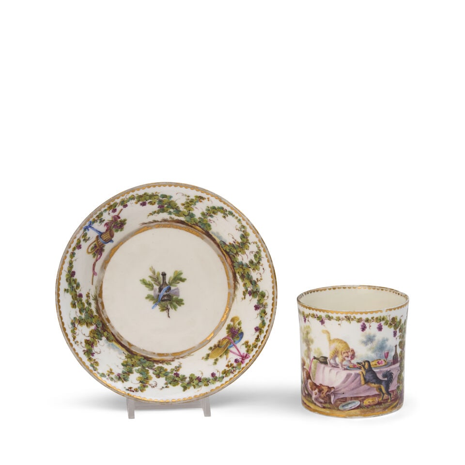A Sèvres Porcelain Cup and Saucer (Gobelet Litron et Soucoupe) Painted with a Cat and Dogs ...: A Sèvres Porcelain Cup and Saucer (Gobelet Litron et Soucoupe) Painted with a Cat and Dogs painted by François-Joseph Aloncle (French, active 1758-1781), dated 1777 Of the second size, inter