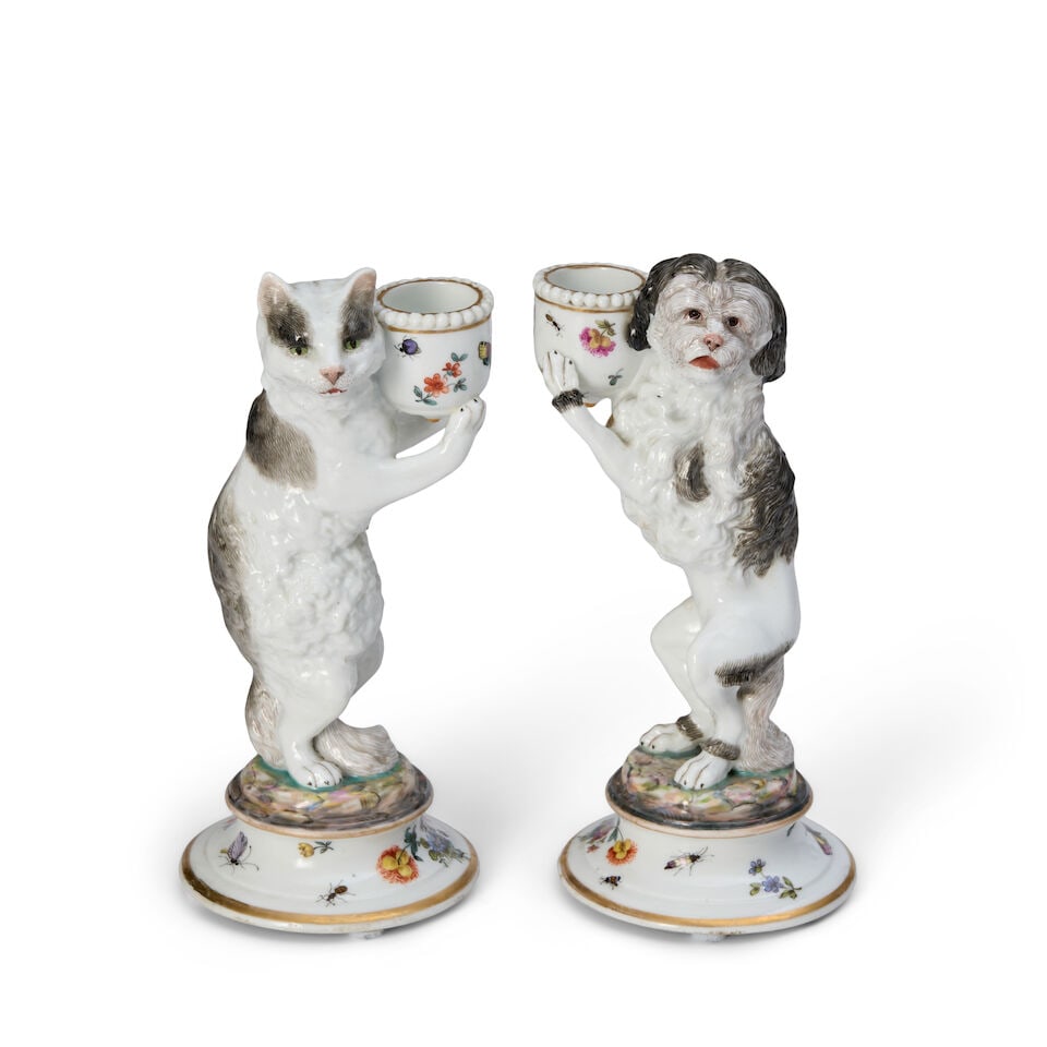 A Pair of Porcelain Candlesticks in the shape of a Cat and Dog probably German, 20th century (1 of 2)