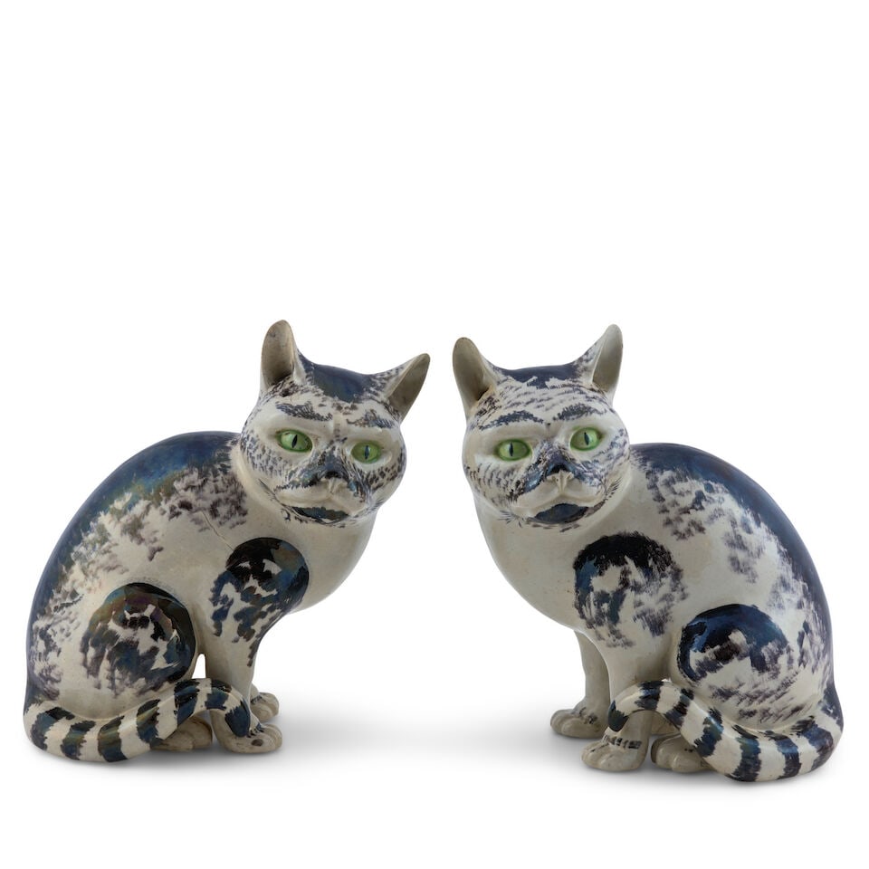 A Pair of Black and White Ceramic Models of Cats China, 19th century (1 of 2)